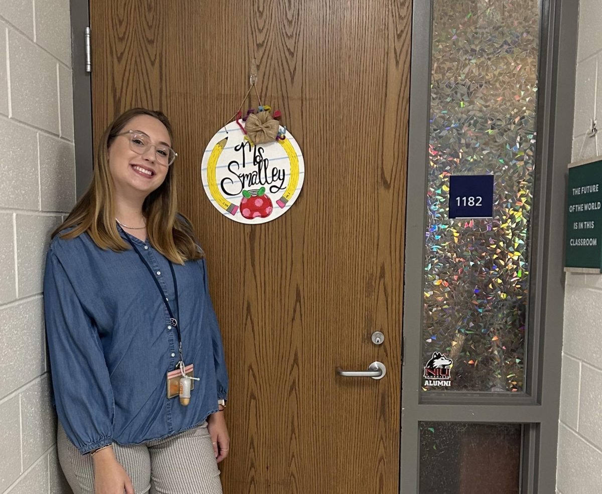 Special education teacher Sarah Smalley poses outside her classroom at West Chicago Community High School (Photo courtesy of Sarah Smalley)