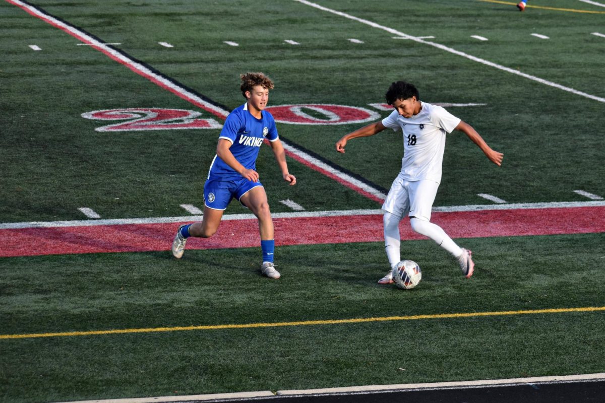 Ulices Huerta, senior, takes the ball down the field, but soon loses control, allowing the Vikings to take possession again.