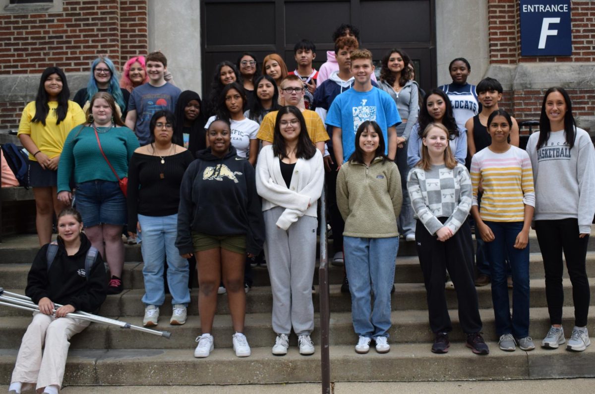 The winners of the WEGO Boutique raffle draw for Homecoming tickets stand outside entrance F after picking up their prize and sending a thank you card for the benefactors who donated the ticket money.