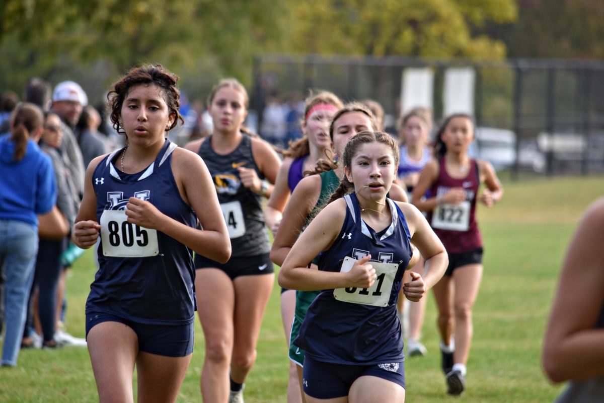 The ultimate goal while running the 5K is to stay together as a pack. Senior Maria Hinojoza and freshman Andrea Armas stuck together through the course, passing the competition. 