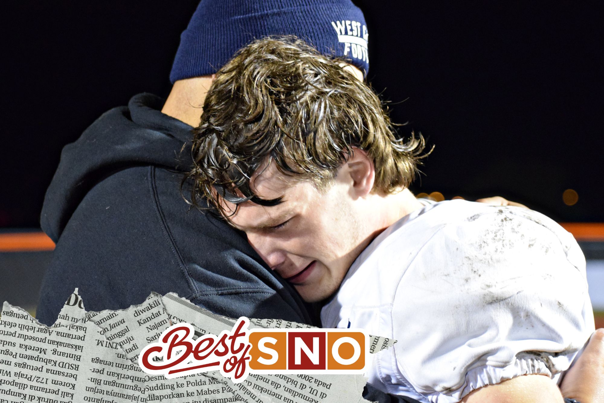 Coach Adam Chavez comforts senior Tommy Murphy after the team's loss to the Ironmen in round one of the playoffs. 