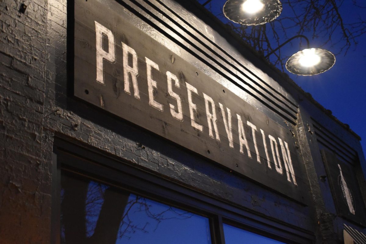 Sign outside of Preservation, showing where they are located and the vibe they bring to the function.