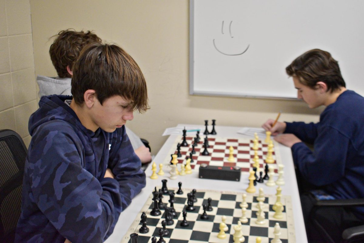 A Wildcat chess player strategizes during practice in Dec. 2024.