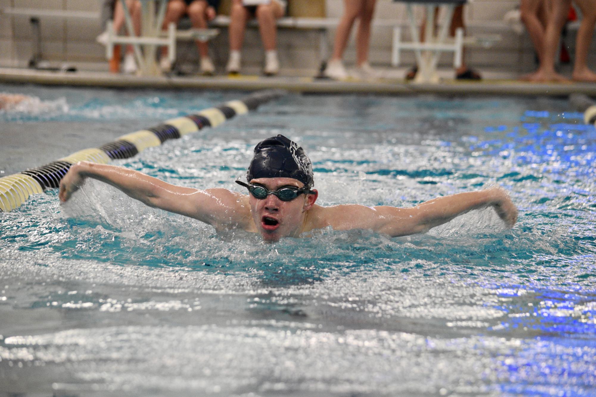 JV swimmer and junior Liam Burke competes in the butterfly on Jan. 31 at the Dan Johnson Natatorium.