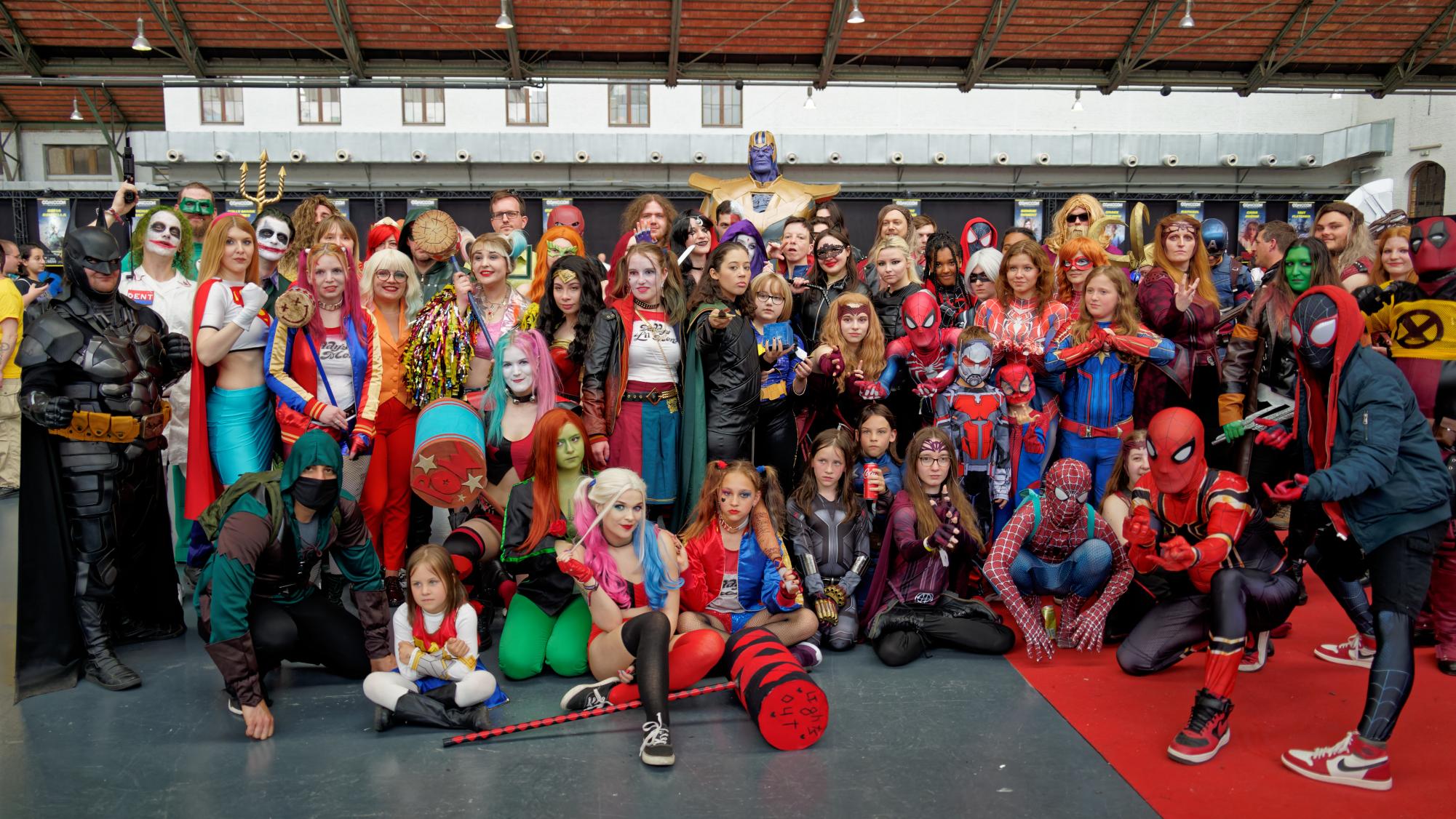 Fans of both Marvel and DC gather together at ComicCon in Brussels in 2023. (Photo courtesy of Miguel Discart and Kiri Karma via Wikimedia Commons)