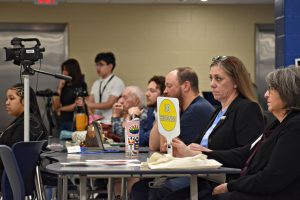 Moderators keep time and monitor the discussion at the West Chicago candidate forum on March 18, ensuring each candidate had equal opportunity to speak.