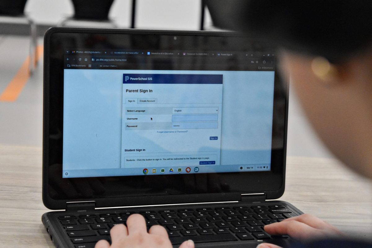 A student logs into PowerSchool on a Chromebook. The student’s ID has been digitally removed from the image for privacy.