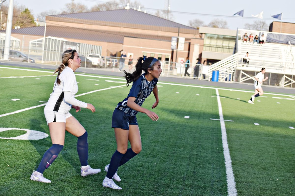 Senior Brianna Carrasco moves into position to intercept a pass at Blue and White Night at WCCHS on March 14. 