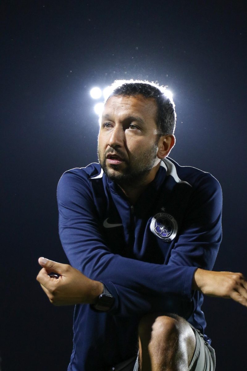 Head coach Jose Villa gives a pep-talk  to the team earlier in the season. When asked what his goals were, Villa said "working for progress".