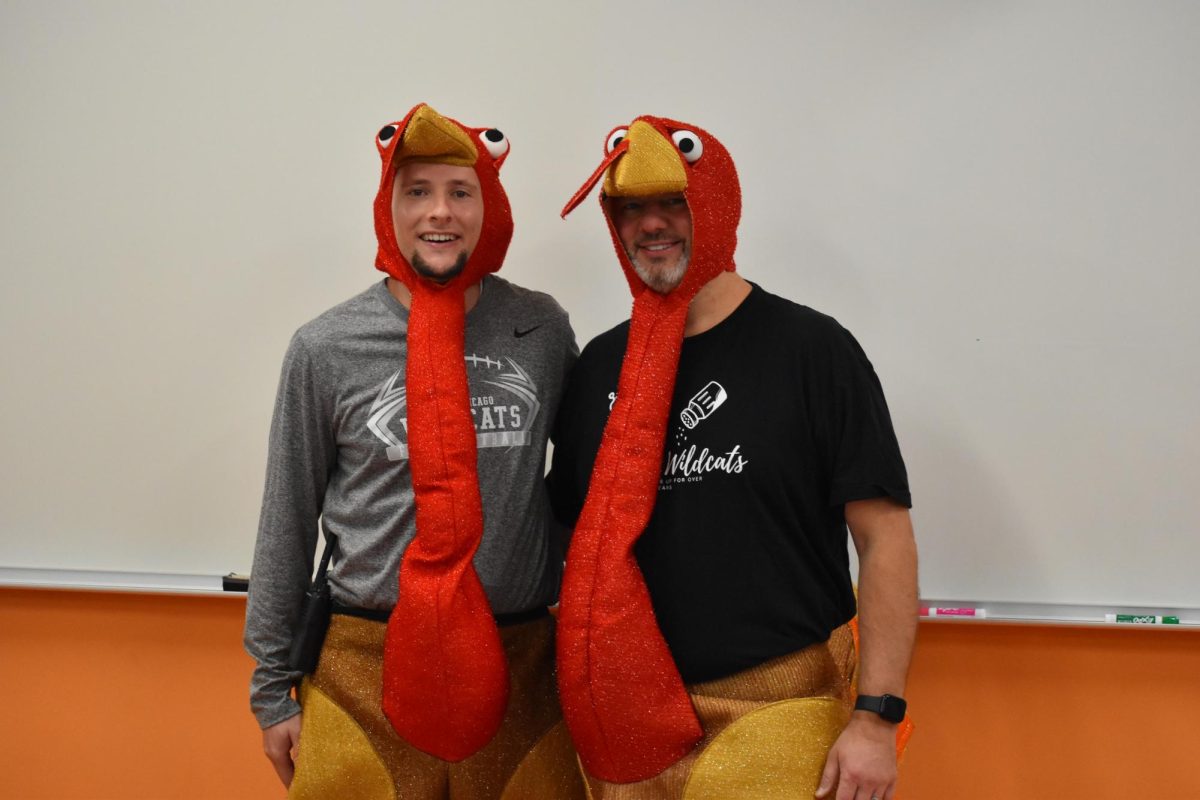 Pictured are physical education teacher and flag football coach Conor Zaputil and choir teacher Brandon Fantozzi. Both turkeys are alumni of West Chicago Community High School.