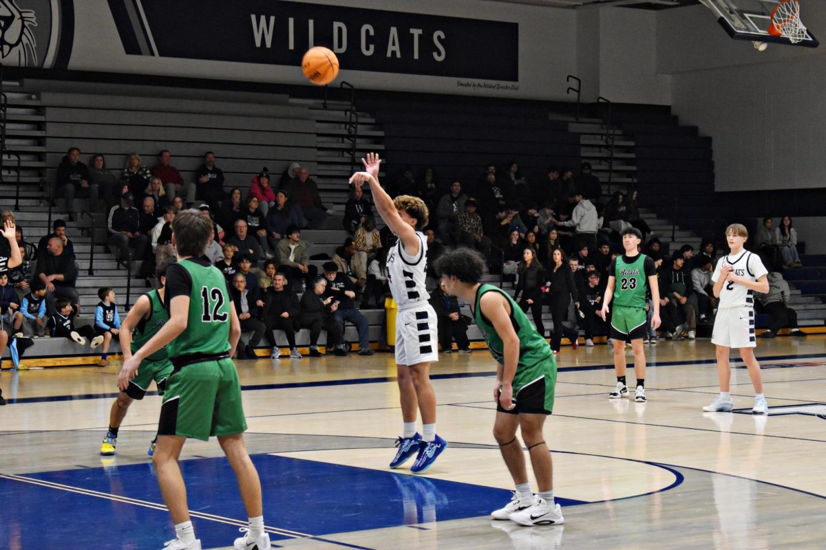 Junior Joseph Mashall gains the Wildcats a point with his free throw.