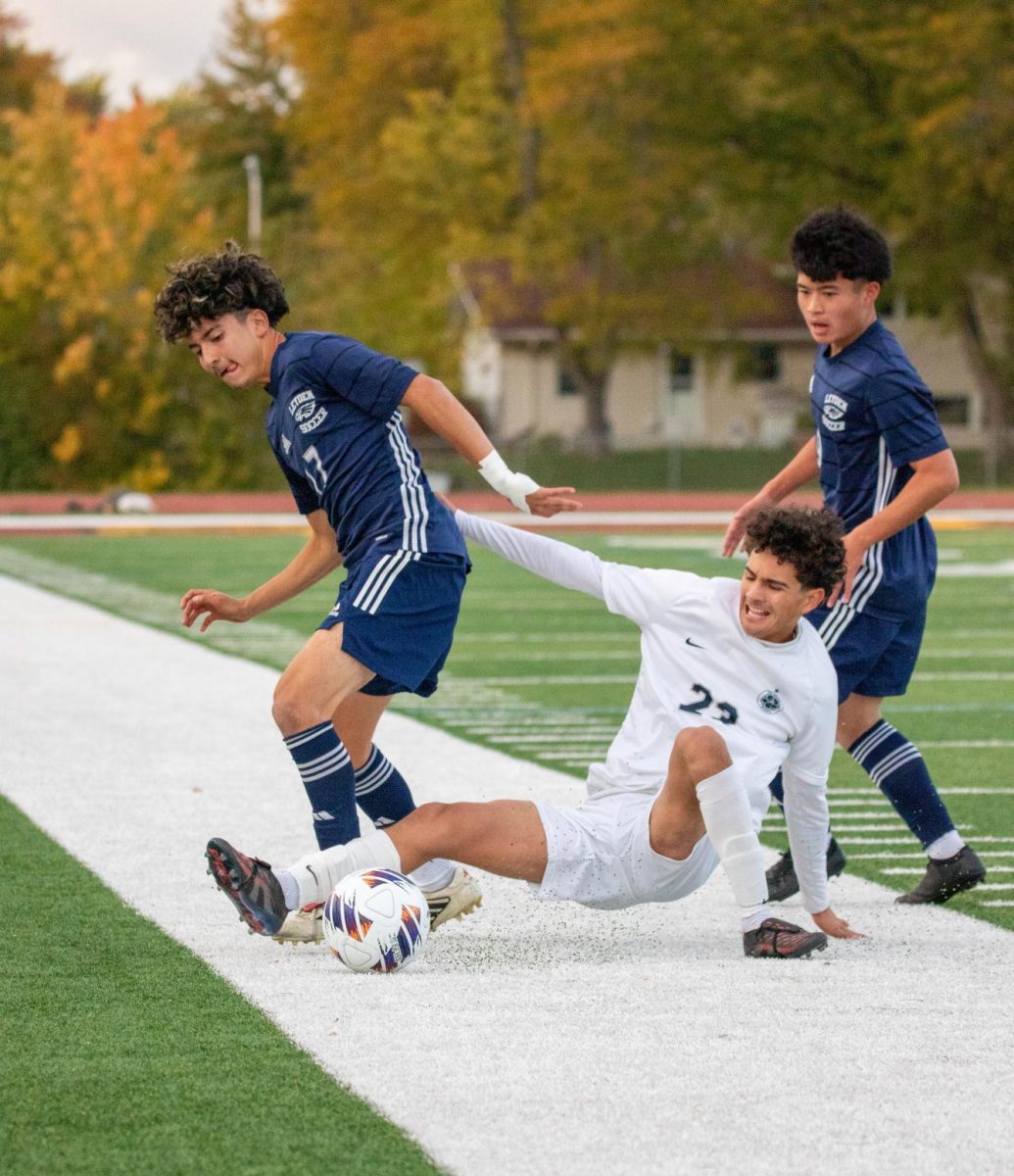 Senior Leo Posada stay in possession of the ball after a duel with one of Leyden's defenders.
