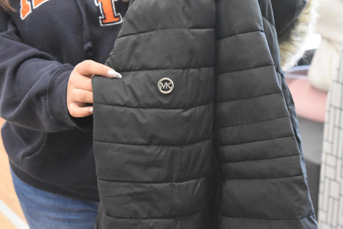 Former student Eilynne Hernandez shows off her coat during the winter of 2025.