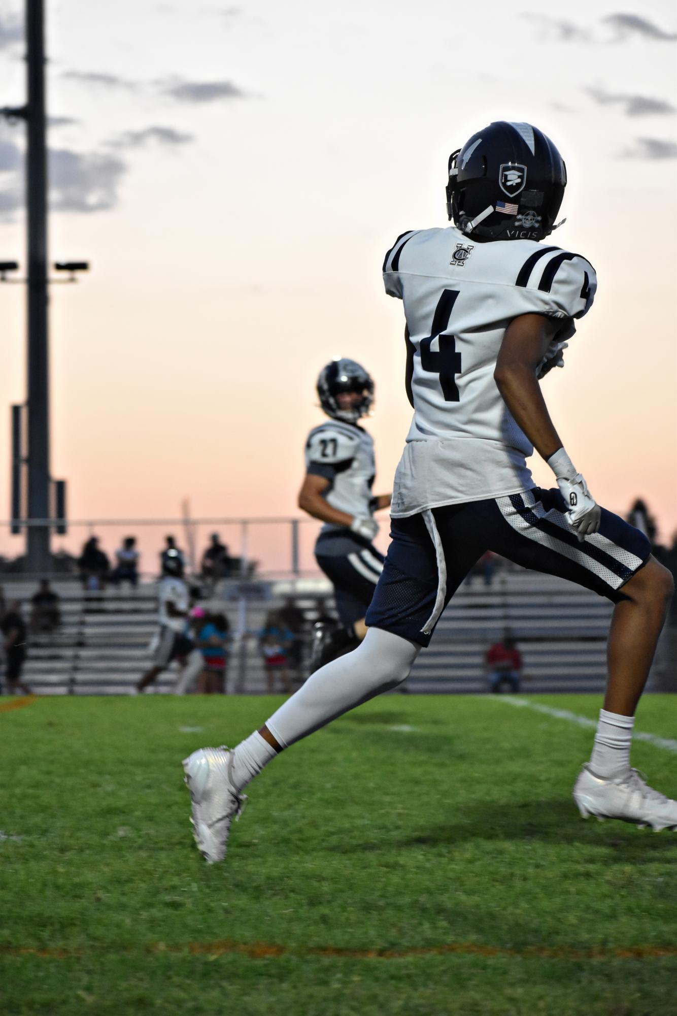 Senior quarterback Carter Naranjo drops back during West Chicago’s Sept. 26, 2025 road game against South Elgin. The Wildcats entered the matchup continuing their push toward a third consecutive playoff-eligible season.
