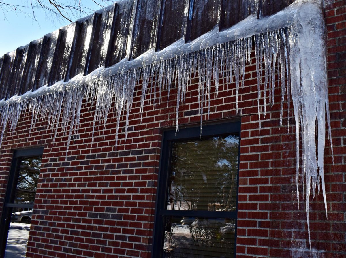 Icicles hang off the south side of West Chicago Community High School in December 2025, an indication of the cold weather affecting the region.