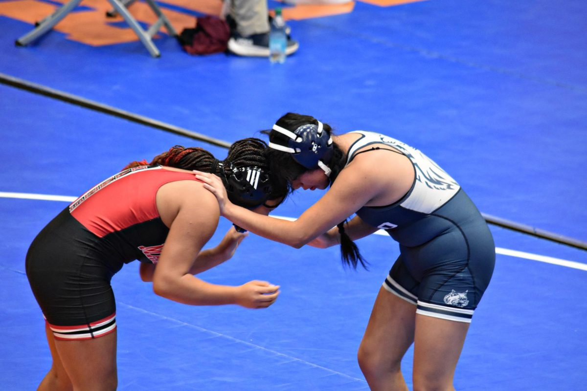 Junior Itzel Flores battles for control during a match at the Girls' Hawk Invite in January 2025.
