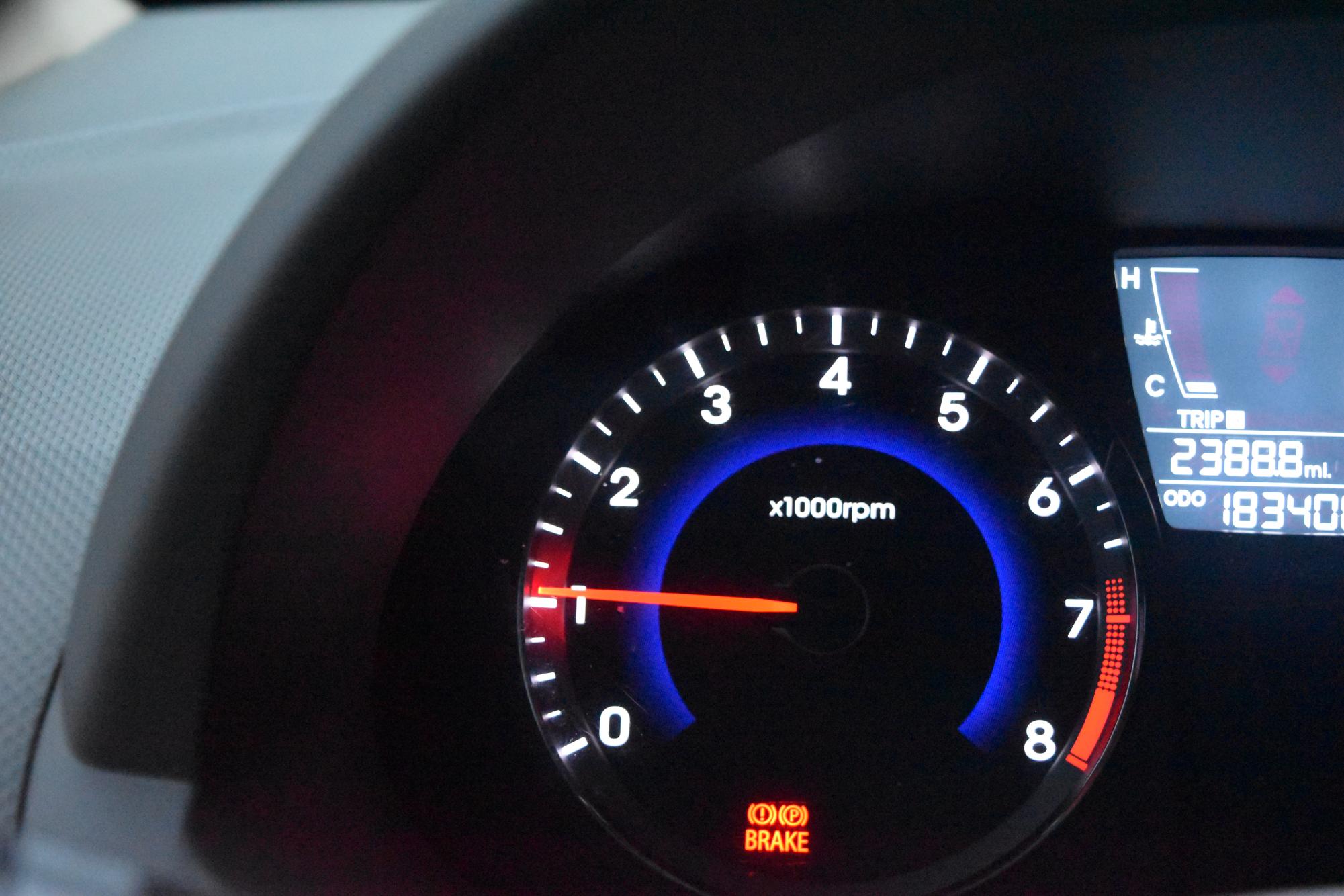 The instrument cluster displays the engine’s revolutions per minute (RPM), measured in thousands. Drivers shift gears based on the engine’s RPM to maintain power and prevent stalling.
