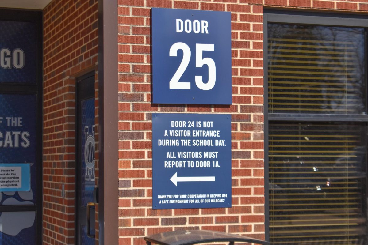 A sign was up at door 24/25 or previously known as door H to let visitors and parents know that the door is not being used for item drop-offs. 