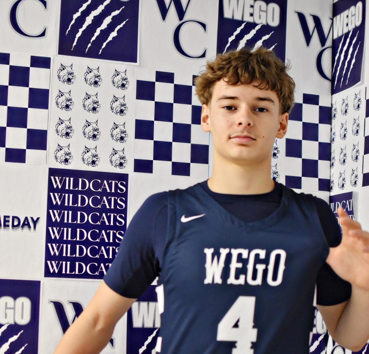 Sophomore Evan Trushov poses during the Wildcat Chronicle’s Winter Media Day. Known for his perimeter shooting, Trushov has emerged as one of the boys’ basketball team’s most consistent offensive threats.