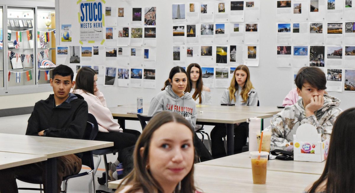 Student Council members visibly react to news regarding prom prices announced by West Chicago Community High School Activities Director Dave Jennings during a Feb. 13 meeting held in the Social Studies hub.