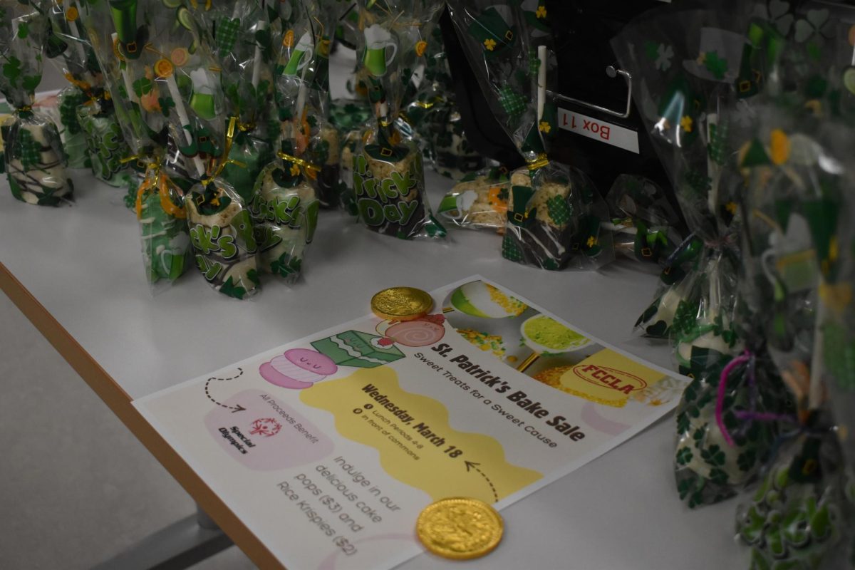 A price list and informational materials sit on the table during FCCLA’s St. Patrick’s Day bake sale on March 18 outside the commons. The fundraiser featured festive treats and supported the Special Olympics.