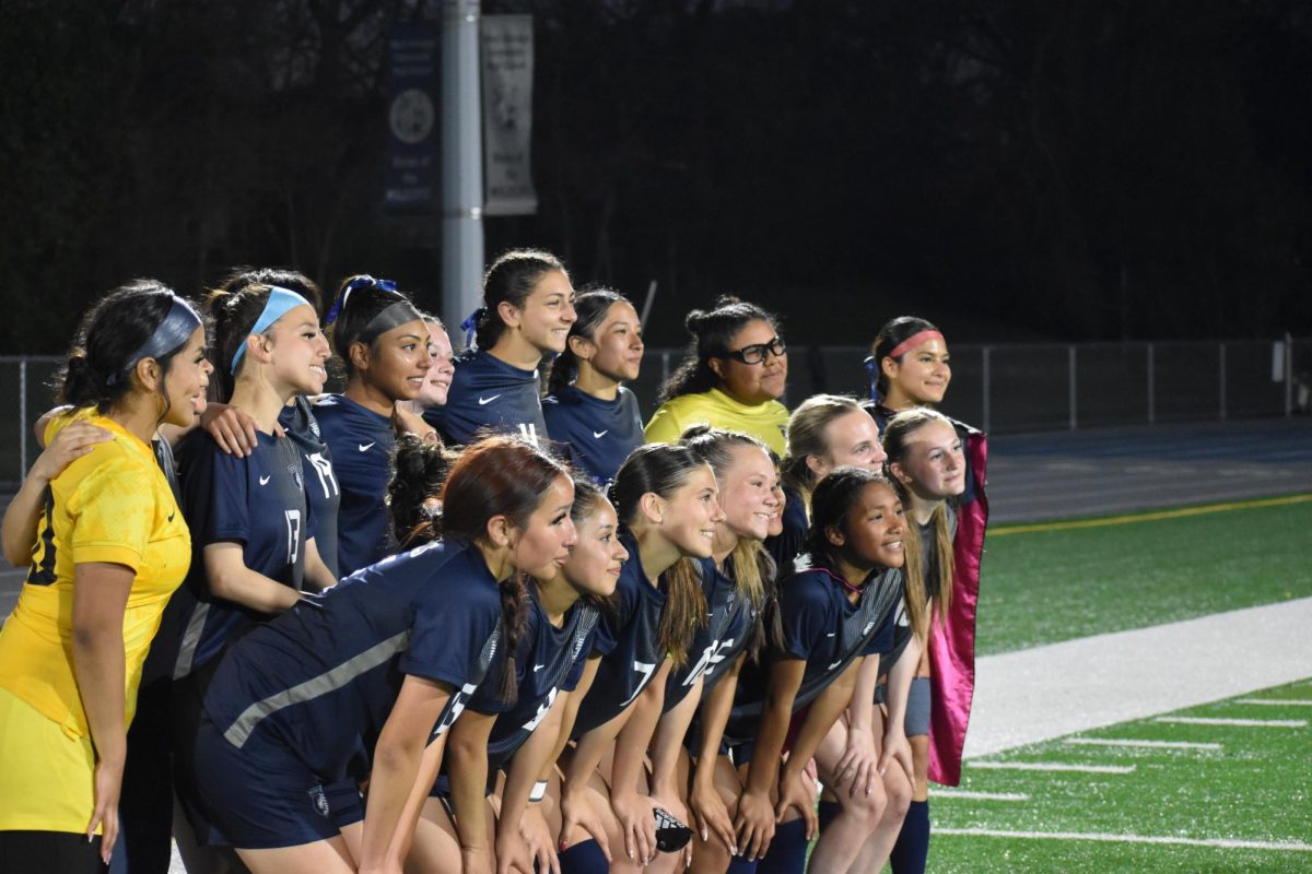 Members of the West Chicago girls soccer team gather for a group photo before their conference matchup against Fenton High School on April 21 at West Chicago Community High School. The Wildcats went on to earn an 8-0 shutout.