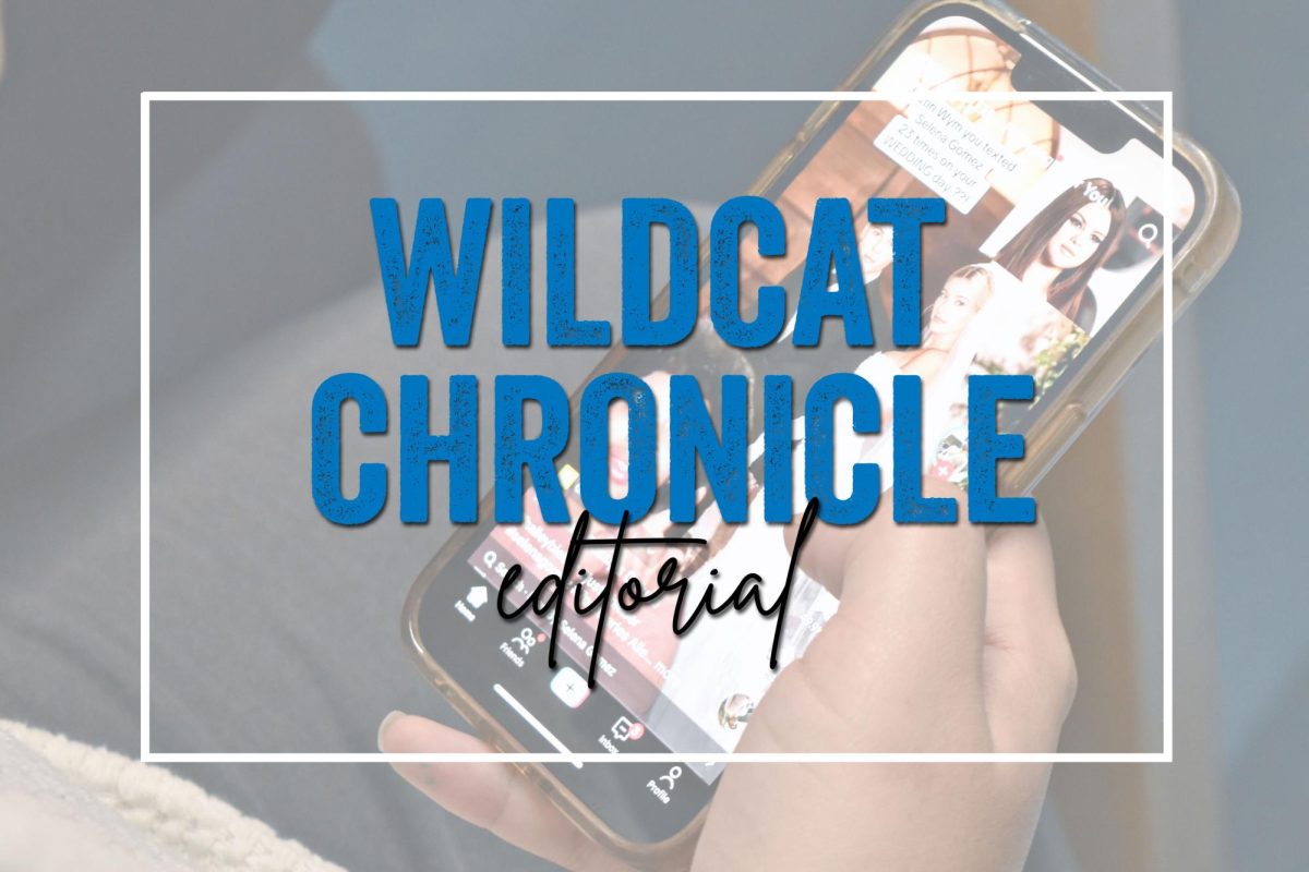 A student scrolls through content on a smartphone, reflecting how digital tools and platforms—including AI—are increasingly shaping how students access information and complete schoolwork.