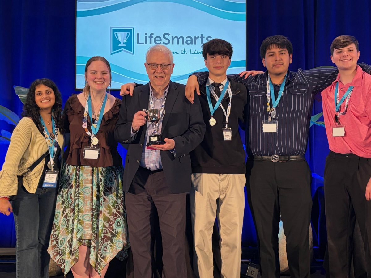 Juniors Niyati Patel, Keelie Steward, Adviser Don Zabelin, Elio Berug, Alexander Jacobo, and Jason Thunberg after their victory. "I am very proud of my team," Patel said. (Photo courtesy of Don Zabelin)