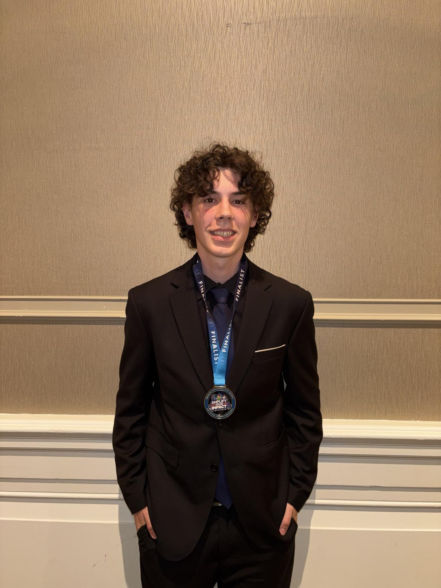 Senior Joey Marszalek poses with his medal after earning fifth place nationally in Fundamental Accounting at the 2026 Business Professionals of America National Leadership Conference in Nashville, Tennessee. Marszalek competed against top qualifiers from across the United States and internationally. (Photo courtesy of Kevin Jarosz)